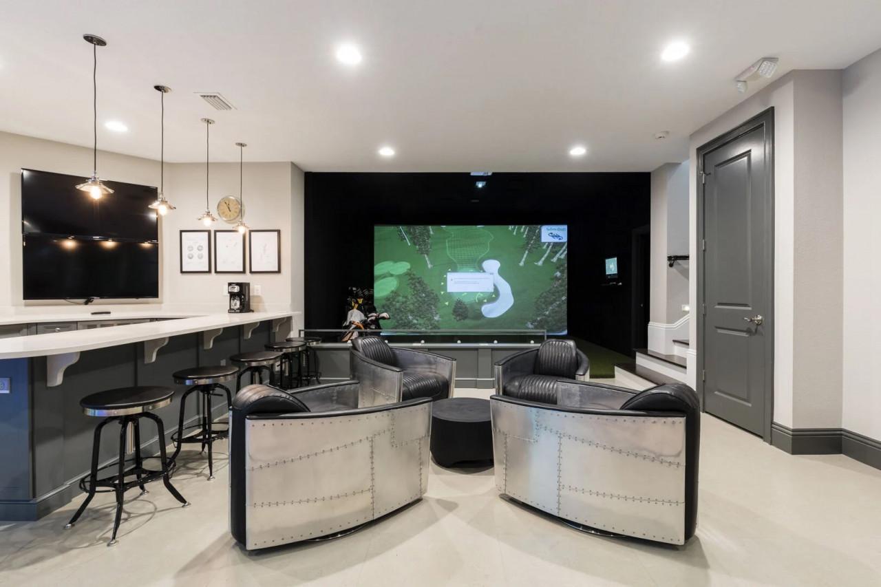 Orlando villas with golf simulators interior or amenity in a luxury property