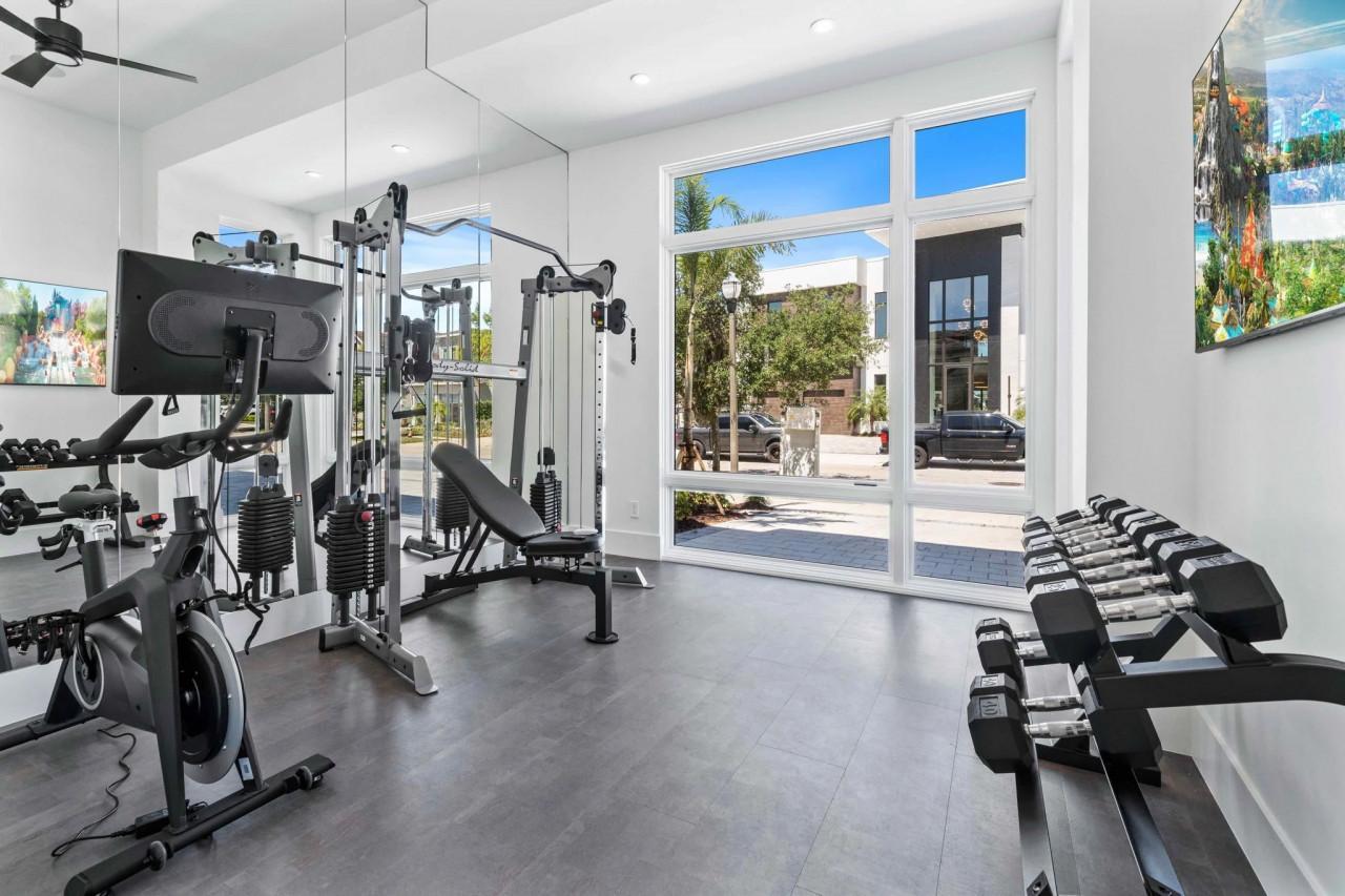 Orlando villas with private gyms interior or amenity in a luxury property