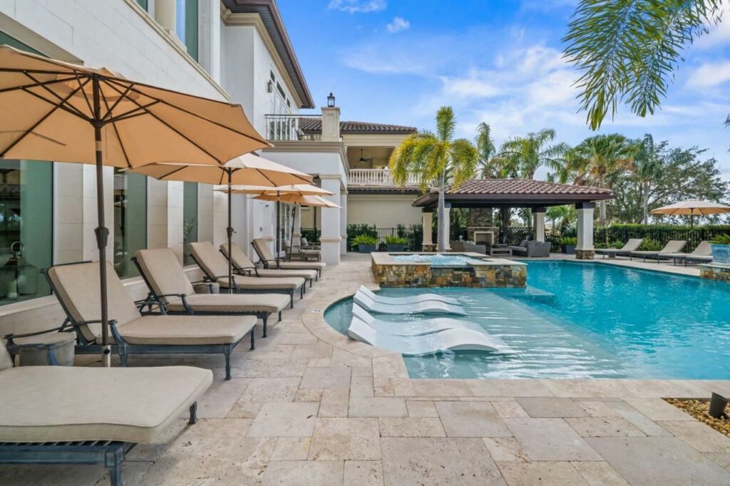 Villa in Reunion Resort, Orlando Florida that has a private pool with sun loungers outside